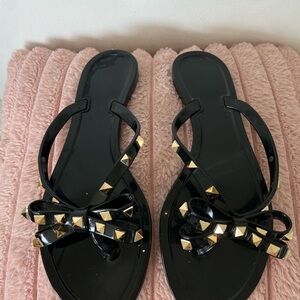 Black bow sandals with gold gems